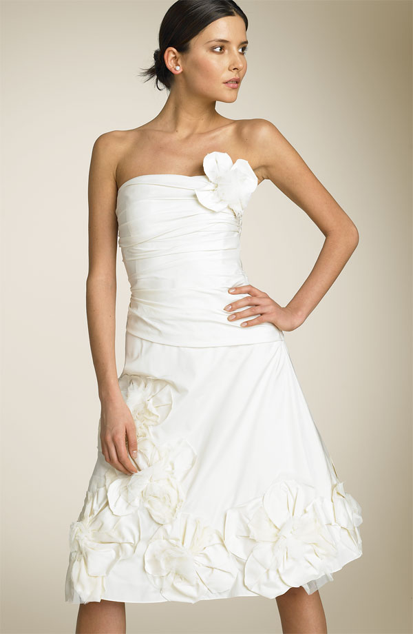 Romantic ivory wedding gown in strapless stye